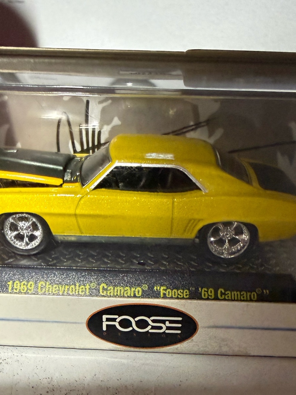 The image shows an M2 Machines Foose Design 1969 Chevrolet Camaro die-cast model